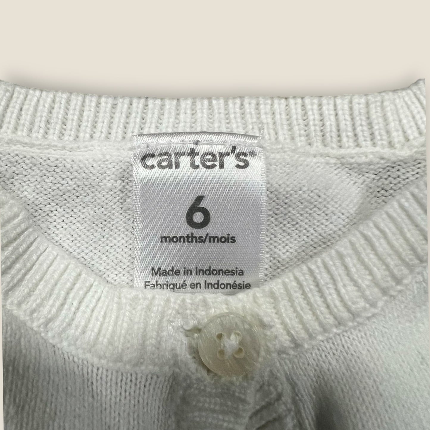 Saco 6 meses Carters